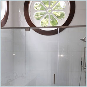 frameless shower door with header
